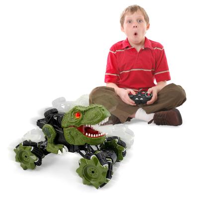 China Kids Car Toy 360 Rotating Dinosaur Car Remote Control Monster Trucks For Boys With Music And Lights for sale