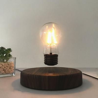 China Floating Wood Grain 3D Desk Table Night Lamp Industrial Magnetic Levitating Light Bulb With Charging Station for sale