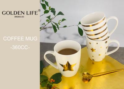 China Ceramische Kerstmis als thema had Mokken360ml Capaciteit met Echt Gouden Ster en Lijnenpatroon Te koop