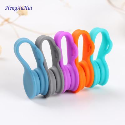 China Hot Sale 5 Color Sealed Silicone Strong Magnetism Silicone Cable Winder for sale