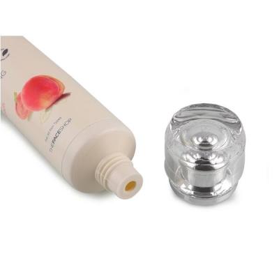 China Recyclable 70g D30mm Matte Plastic PE Tube with Diamond Acrylic Cap Facial Cleanser Tube for sale