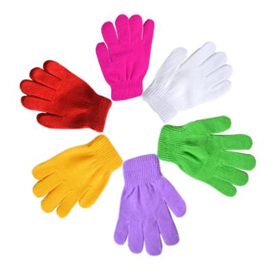 China Cheap spot price primary school students winter comfortable writing warm gloves monochrome acrylic kids gloves custom logo for sale