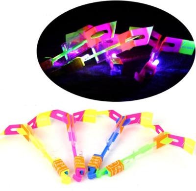 China Funny Amazing Rocket Helicopter Flying Toy LED Flash Light Arrow Baby Toys Party Fun Gift Christmas for sale