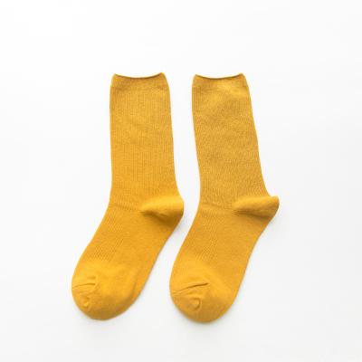 China 2021 high quality QUICK DRY high quality women's socks pile cotton slouch polyester hot sale colorful red women's socks for sale