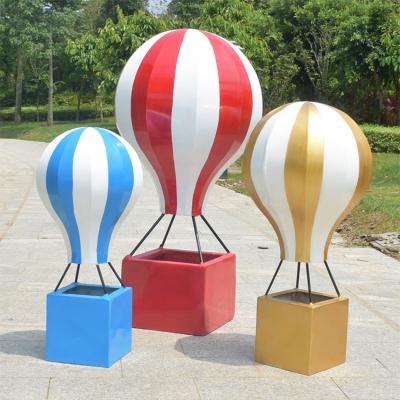 China Outdoor mall artificial decoration store dessert fiberglass reinforced plastic simulation hot air balloon sculpture for sale