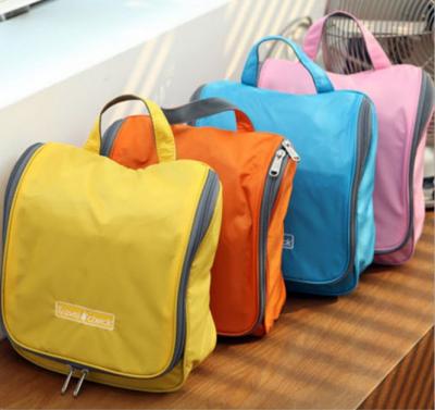 China Cheap Wash Bag Oxford Bag Four Color Pocket Travel Wash Bag Hanging Cosmetic Bag for sale