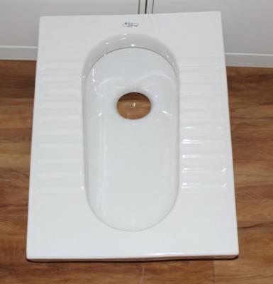 China Without WC Cheap Ceramic Squat Pan Toilet Fender With Plastic Water Tank (HS-210) for sale