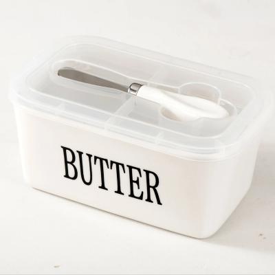 China Freshness Preservation 650ML Ceramic Butter Dish Box Modern White Rectangle Butter Storage Container With Plastic Lid and knife for sale