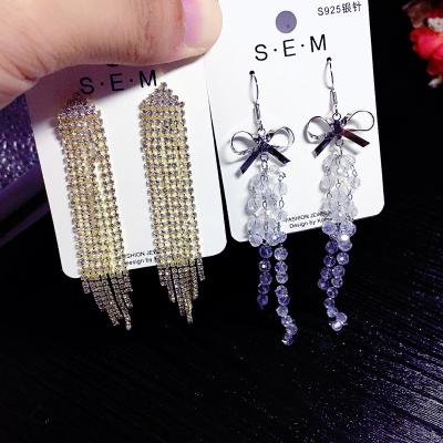 China PUSHI New Product 2021 New Product Claw Chain 925 Rhinestone Zircon Tassel Simple Silver Women's Needle Earrings Long Fringe Earrings Mix for sale