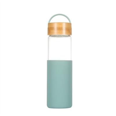 China High Borosilicate Glass Sustainable Water Bottle With Silicone Ring And Bamboo Lid Daily Life Drinking Water Bottle for sale