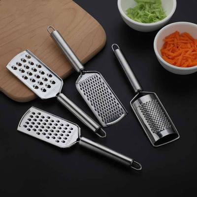 China Wholesale Potato Stocked Stainless Steel Kitchen Fruit Instrument Carrot Slicer Ginger Vegetables Grater for sale