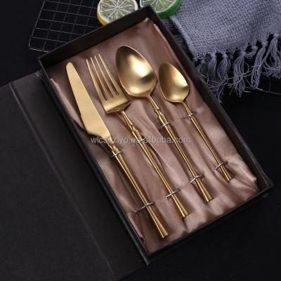 China Morden Luxury Premium Royal Gold Polished 4 Piece Titanium Stainless Steel Knife Spoon Fork Flatware Cutlery Set for sale