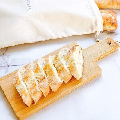 China Sustainable Multifunctional Rectangle Long Handle Cheese Cutting Board Bamboo for sale