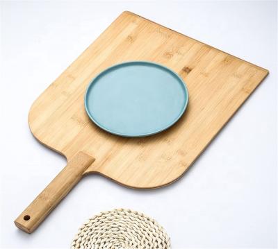 China Sustainable Newest Design Good Quality Bamboo Material Practical Pizza Skin Pallet for sale