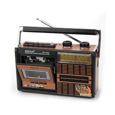 China Retro Cassette Tape Portable Clock Radio Wireless Stereo With Telescopic Antenna for sale