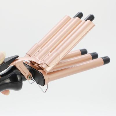 China Household Professional Hot Selling Salon Curler Tool Wave Hair Curling Iron Eco-Friendly Rotating Ceramic Curling Iron New for sale