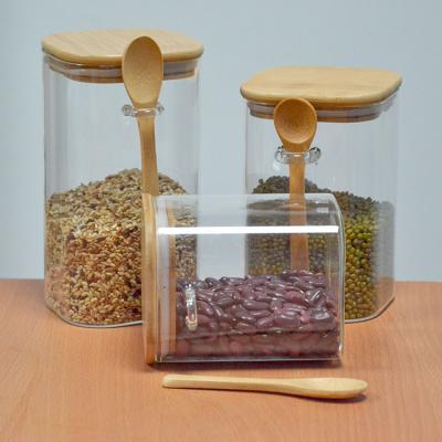 China Sustainable Airtight Square Bamboo Kitchen Borosilicate Glass Spice Jars With Spoon for sale