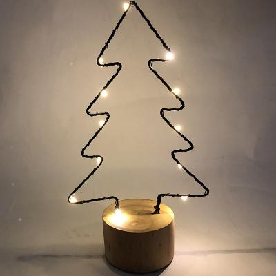 China Xmas Tree Christmas Tree Decoration Light Wooden Base with Metal Copper Wire Lights for sale