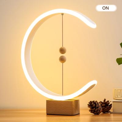 China Modern Modern Bed Side Hotel USB Reading Ring Night Rope Nordic Balance Circle Led Table Lamps for sale