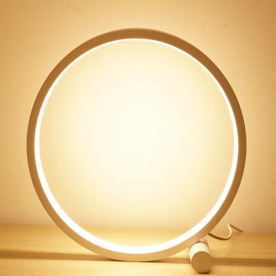 China Eco-friendly Modern Minimalist Warm Light Bedroom Decor Dimmable Round Circle Office Desk Led Table Lamp for sale