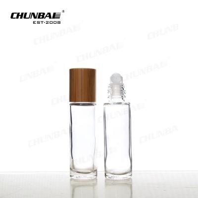 China Arab 10 Ml 30 Ml 50ml 90ml Roll On Frosted Clear Perfume Oil Glass Leak Proof Roll-On Bottle Wooden Cap for sale