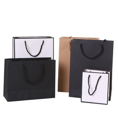 China Recycled Materials Promotion Gift Wrapping Paper Bag Packaging Black White Black Luxury Shopping Paper Bags For Jewelry Packaging Clothes for sale