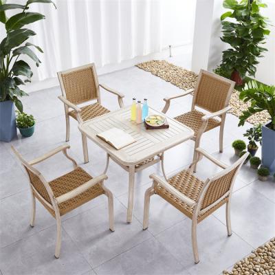 China Factory Wholesale Eco-friendly Leisure Foshan Waterproof Rattan Chair Set Wicker Woven Chair 5pcs Dining Table Set for sale