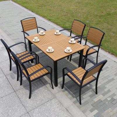 China Eco-friendly Waterproof Patio Garden Sets Plastic Wood Outdoor Backyard Dining Table Furniture for sale