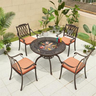 China Multifunctional Eco-friendly Outdoor Dining Table Garden BBQ Table Set Cast Aluminum BBQ Grill Patio Furniture for sale