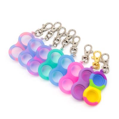 China Silicone Finger Bubble Key Chain Innovative Luminous Sensory Toy for sale