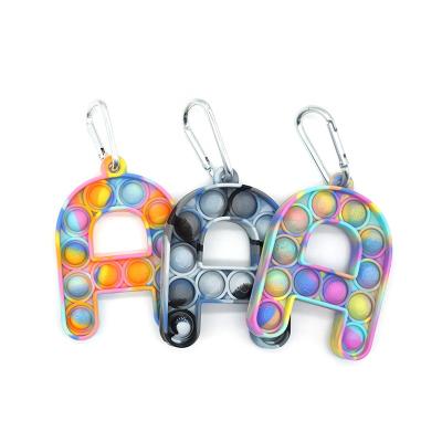 China Innovative Key Chain Type Finger Silicone Bubble Sticky Person Sensory Toy for sale