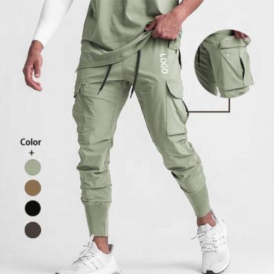 China Wholesale Custom Anti-Static Gym Fitness Wear Mens Cargo Joggers Pants With Side Pockets Jogger Pants For Men for sale