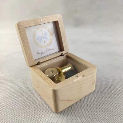 China 2020 China High Gold Color Automatic Music Glass Wooden Movement Music Box With Photo Insert for sale