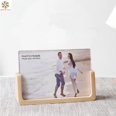 China New Design Fashionable Wooden Swing Photo Frame Wedding Wooden Picture Frames for sale