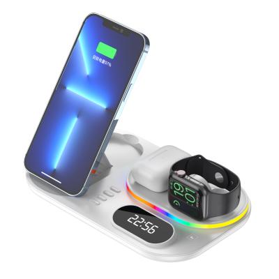 China cellphone/earphone/watch 30w 4 in 1 wireless charging dock for iphone 12 11 13 for iwatch for earphone fast QI fast charger with digital pendulum for sale