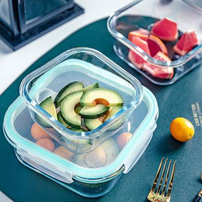 China Oven Safe Borosilicate Glass Heat Resistant Microwave Lunch Box Food Container Full Separation 2 Compartments Microwavable Glass for sale