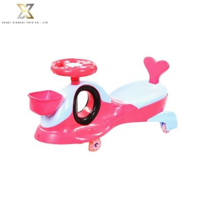 China Ride On Wheel Toy China Supplier Cheap Price Kids Snap Wheel Swing Car With Basket Original Quality PP Plasma Car Twist Car for sale