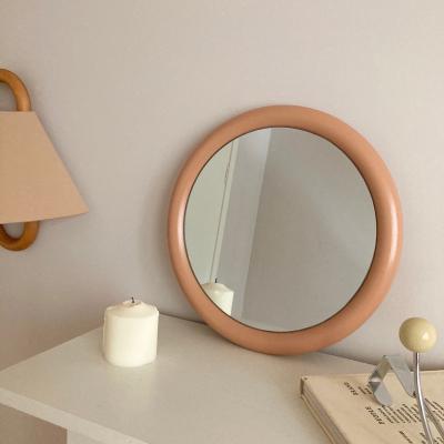 China Minimalist Modern creative candy wall decoration geometry round wall hanging mounted dressing frame wall mirror for bedroom for sale