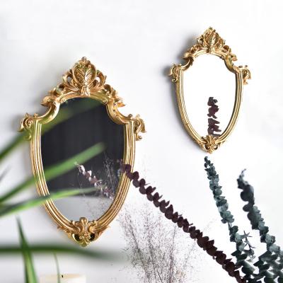 China Vintage Custom vintage geometry wall decor frame shield shaped gold charging makeup vanity wall mirror for living room bathroom bedroom for sale