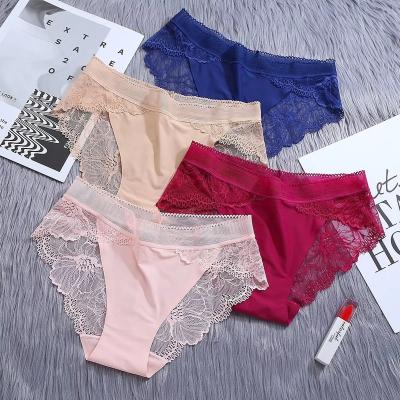 China XuanLing Wholesale Breathable Ice Silk Seamless Panties Lace Up Mesh Breathable Briefs Mid Waist Lingerie Underwear For Women for sale