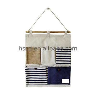 China Sustainable Fashion Wall Folder Organizer Cardboard Pockets Decorative Canvas Pocket Storage for sale