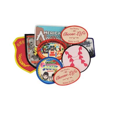 China Viable Colorful Anime Embroidery Badges Printed Embroidered Patch Iron On Backing Hand Cut Border Embroidery Patches For Jacket for sale