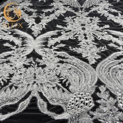 China 2018 Wholesale Viable White Fashion Design Mesh Embroidered Sequins Lace Fabric Garment Accessories Dress Lace for sale