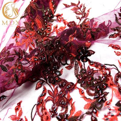 China 140cm Width Hot Selling Handmade Elegant 3D Applique Embroidery Sequins Beads French Net 3D Rhinestone Dress Lace Fabric for sale