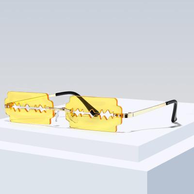 China Partying glasses 2021 unisex frameless sunglasses party blade shape women punk men for sale