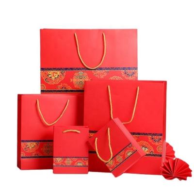 China Durable Paper Bag Manufacturers Custom Wholesale Gift Packaging Shopping Bags With Your Own Logo for sale