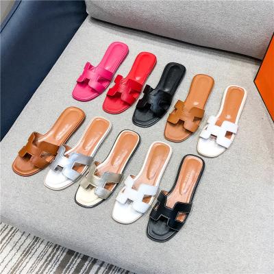 China Fashion Trend Ladies Shoes Flat Casual Oral Sandals Branded Outdoor PU H Slide One Tong Slippers Womens Flat And Sandal for sale