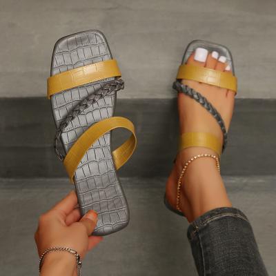 China 2022 popular fashion trend newcomer summer women slides sandal shoes weaving flat slipper slides for women and ladies for sale