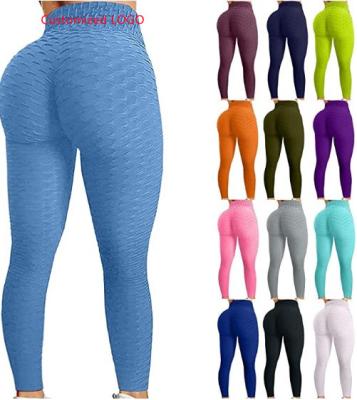 China Customized Breathable LOGO Sports Fitness Pants Yoga Slimming Tight Hips High Waist Gaiters Bubble Yoga Pants for sale