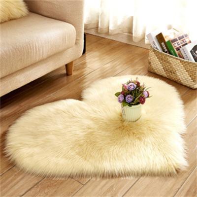 China Washable Solid Color Fur Blanket Acrylic Fibers Faux Carpets Outdoor Indoor Heart Shaped Faux Carpets for sale